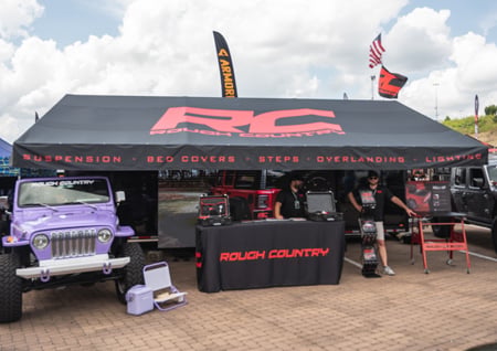 from-bed-caps-to-bumpers-rough-country-at-jeep-invasion-2025-image